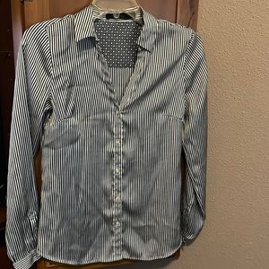 Long sleeve women’s striped blouse.